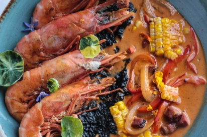 black shrimp and grits