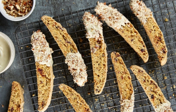 several pieces of biscotti on a cooling rack 