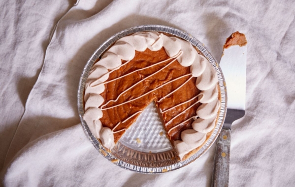 vegan sweet potato pie on white tablecloth