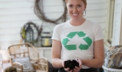 woman holds soil in her hands